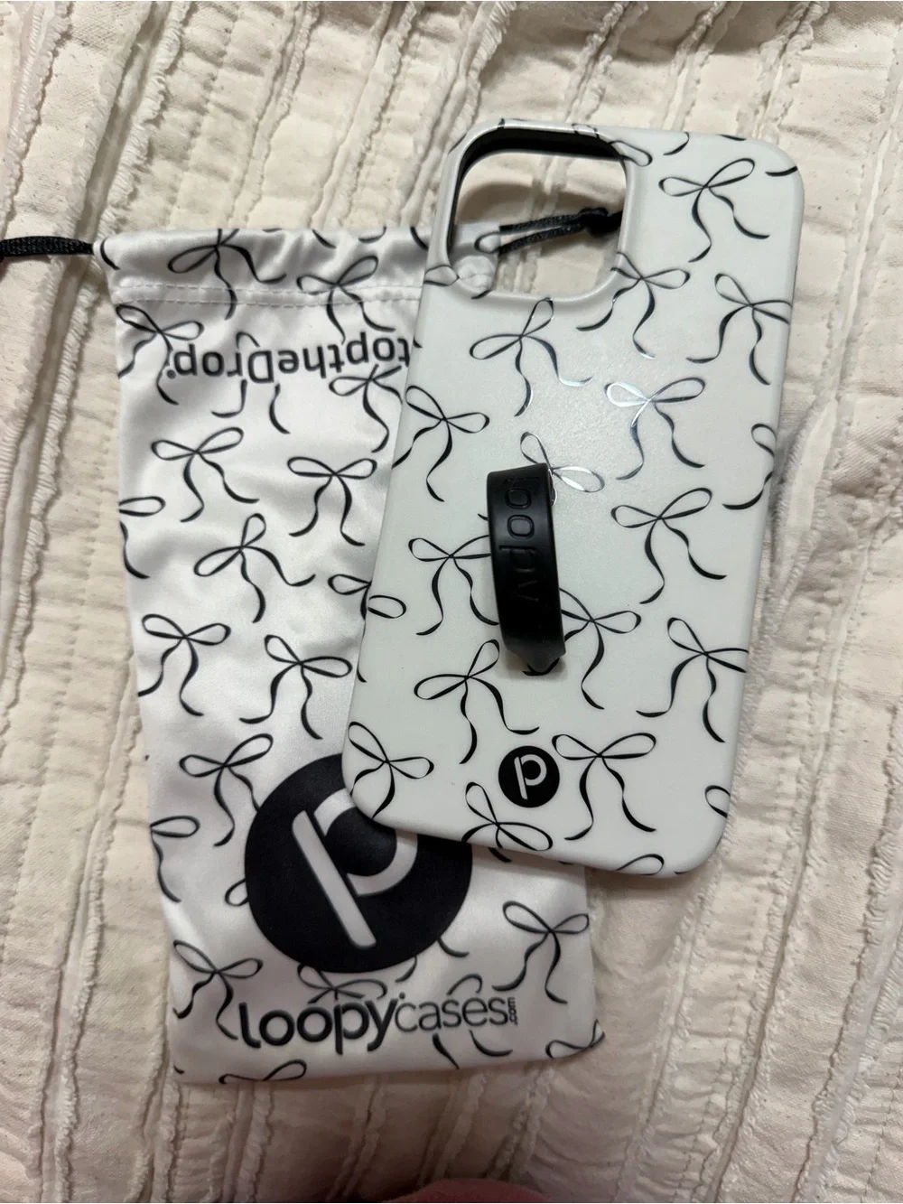 Loopy Case White Phone Case with Black Bow Pattern and Black Loop Grip